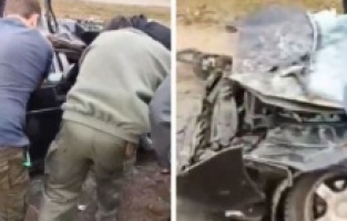 Rus tankı sivil aracı ezdi, sürücü ezilen araçta mahsur kaldı