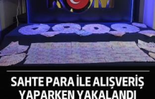 Sahte para ile alışveriş yaparken yakalandı